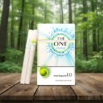 ซองบุหรี่ The One Change พร้อมมวนบุหรี่ วางบนโต๊ะไม้ท่ามกลางบรรยากาศป่าไม้ธรรมชาติ