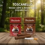 กล่องซิการ์ Toscanello Rosso Caffè สีแดง และ Rosso Macchiato สีน้ำตาล วางบนโต๊ะไม้พร้อมตัวมวนซิการ์ในบรรยากาศป่า