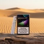 บุหรี่ Mevius Option 2 No.5 ของแท้จากญี่ปุ่น กลิ่นองุ่นและเมนทอล 2 เม็ดบีบ วางบนขอนไม้กลางทะเลทราย